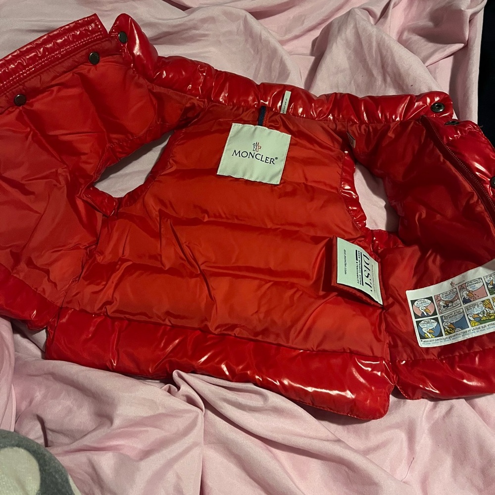 Kids monclervest  worn twice to little 9-12 months